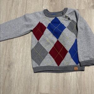 Gray Argyle Sweater with Red and Blue Accents